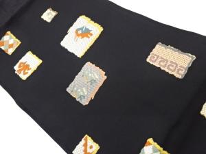 変わり色紙に鳥獣・幾何学模様織出し名古屋帯